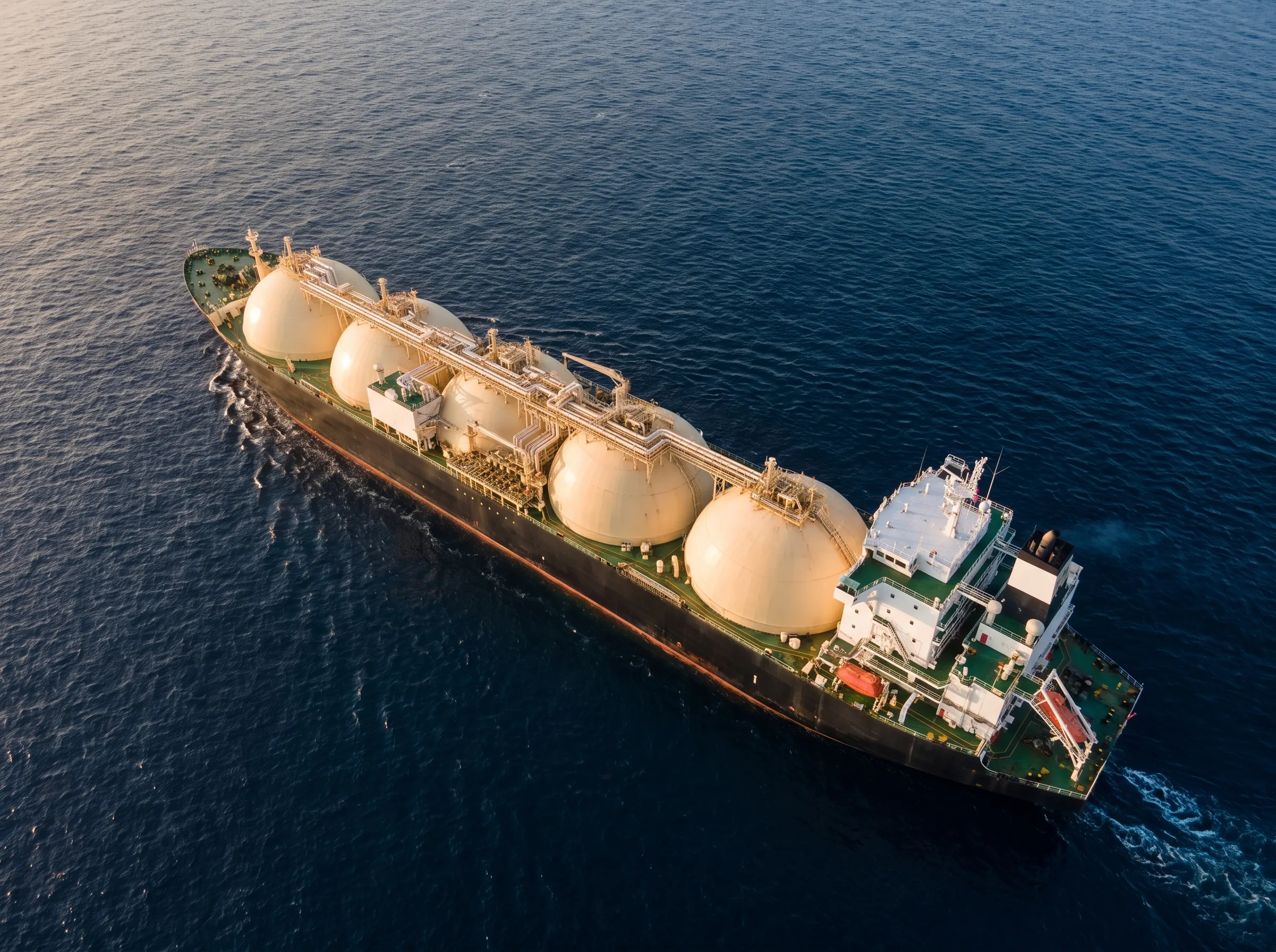 An LNG carrier with spherical cargo tanks at sea